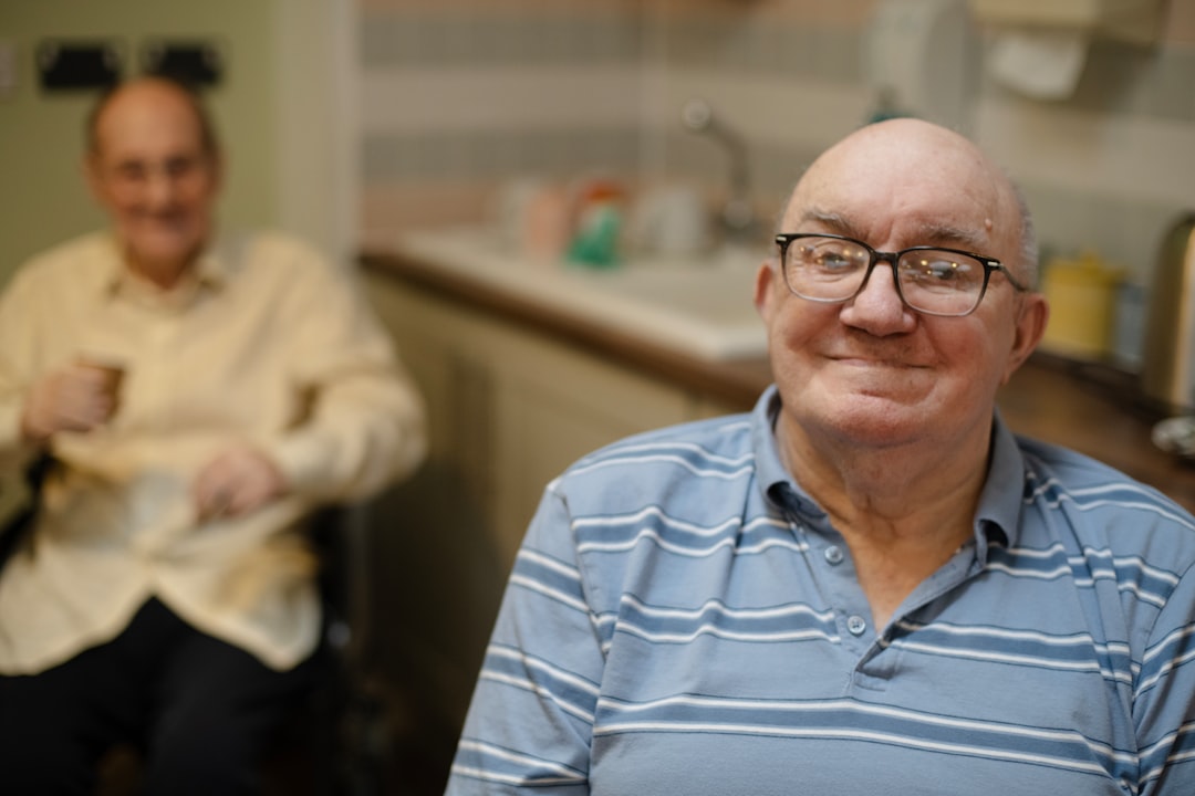 A welcoming independent living community with residents engaging in social activities, showcasing comfort and safety.