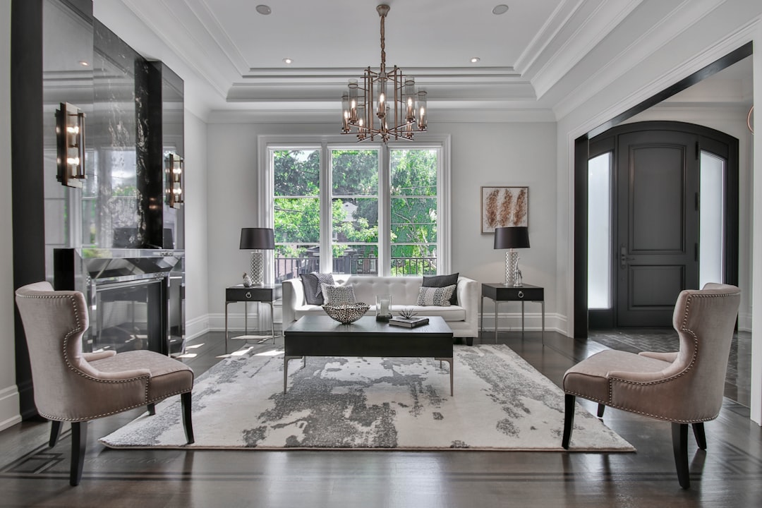 A beautifully styled living room with elegant decor, rich textures, and soft lighting that conveys a sense of luxury and sophistication.