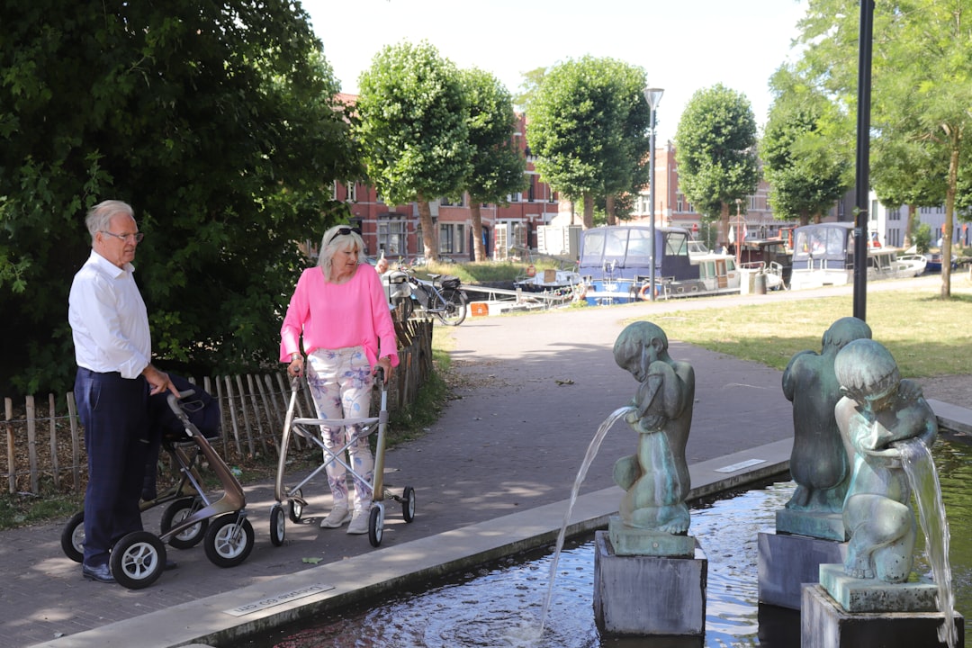 A serene and welcoming independent living community with gardens and accessible pathways for older adults.