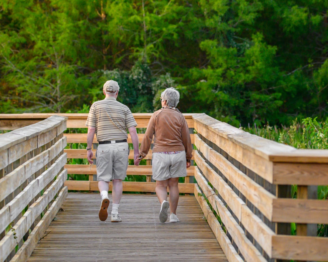 A family discussing options in a senior living community setting, with a warm and inviting atmosphere.