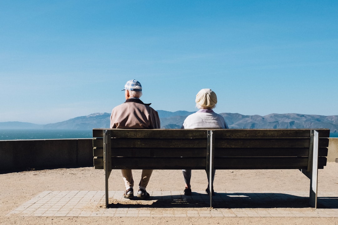 A serene and welcoming independent living community with seniors enjoying activities in a garden setting.